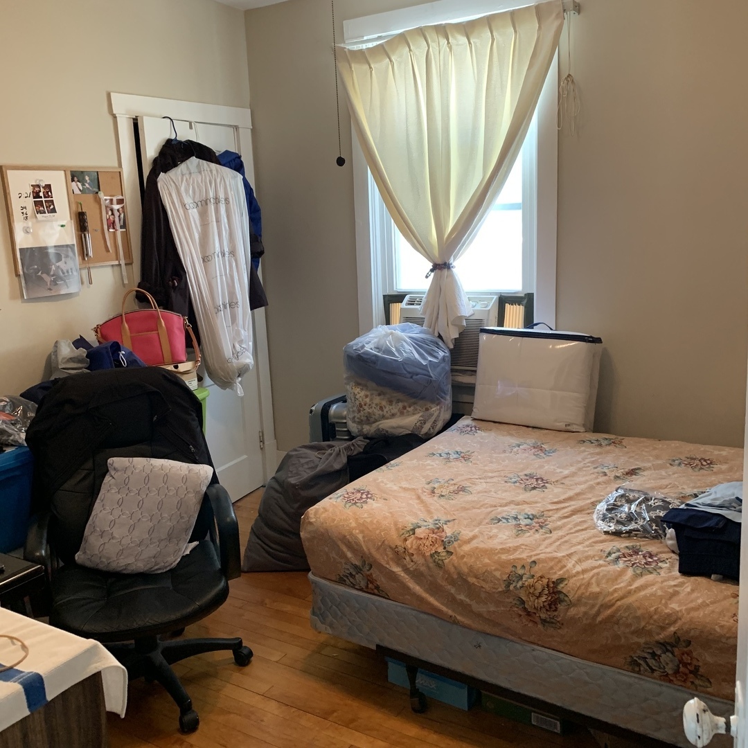4017 North Spaulding Avenue Chicago, IL 60618 - Photo 29 of 30 a bedroom with two beds and a window