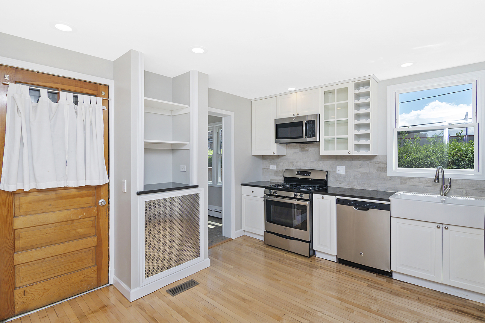 4017 North Spaulding Avenue Chicago, IL 60618 - Photo 6 of 30 a kitchen with a refrigerator stove and sink