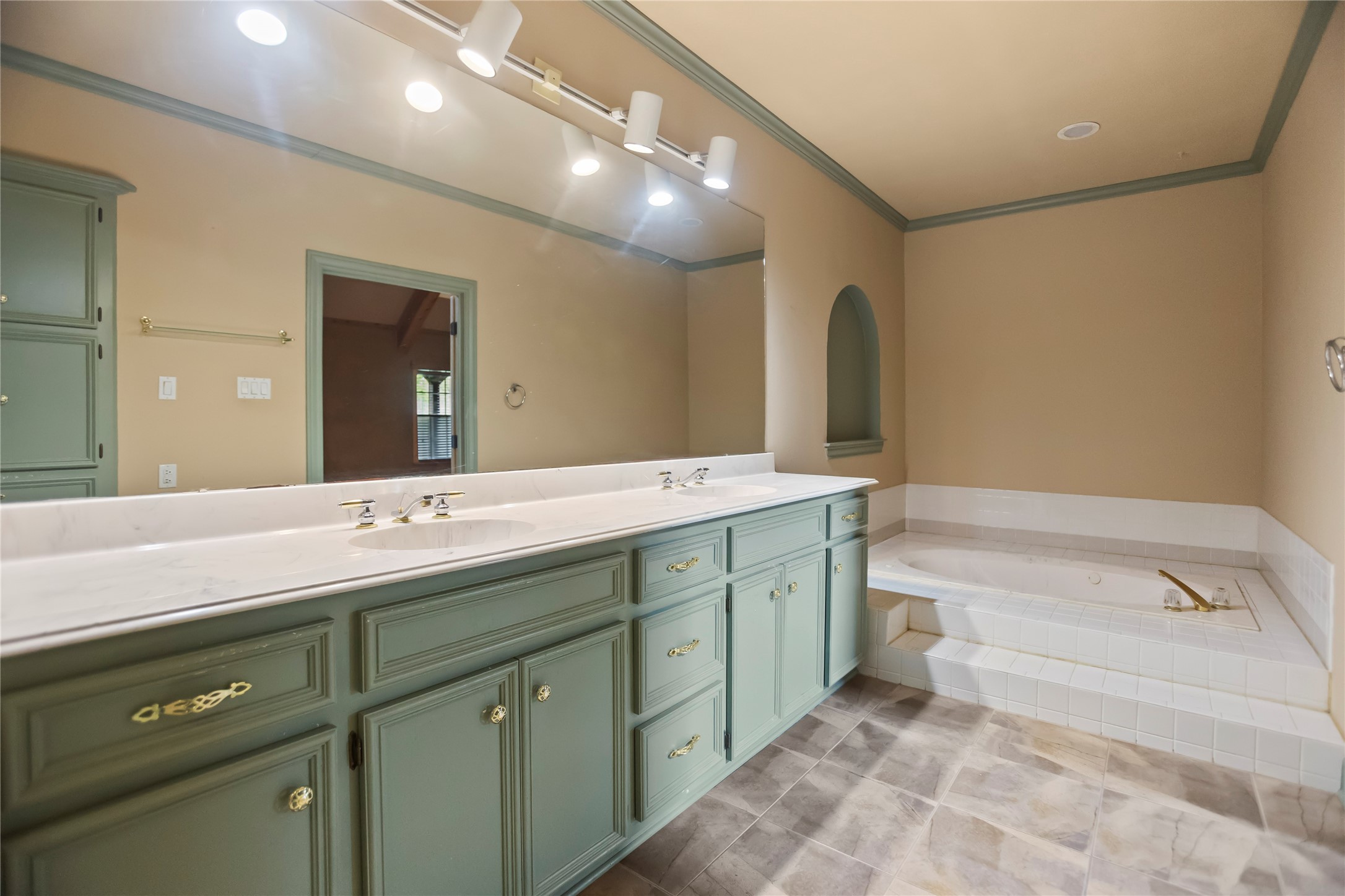 22916 East Martin Drive Porter, TX 77365 - Photo 24 of 43 a spacious bathroom with a double vanity sink mirror and bathtub