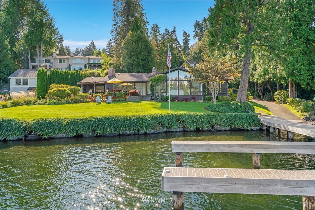 3436 Evergreen Point Road Medina, WA 98039 - Photo 2 of 16 a view of a house with pool and a yard