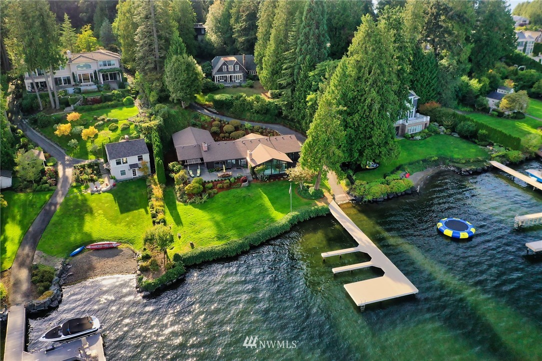 3436 Evergreen Point Road Medina, WA 98039 - Photo 16 of 16 a view of a golf course with chairs in front of house