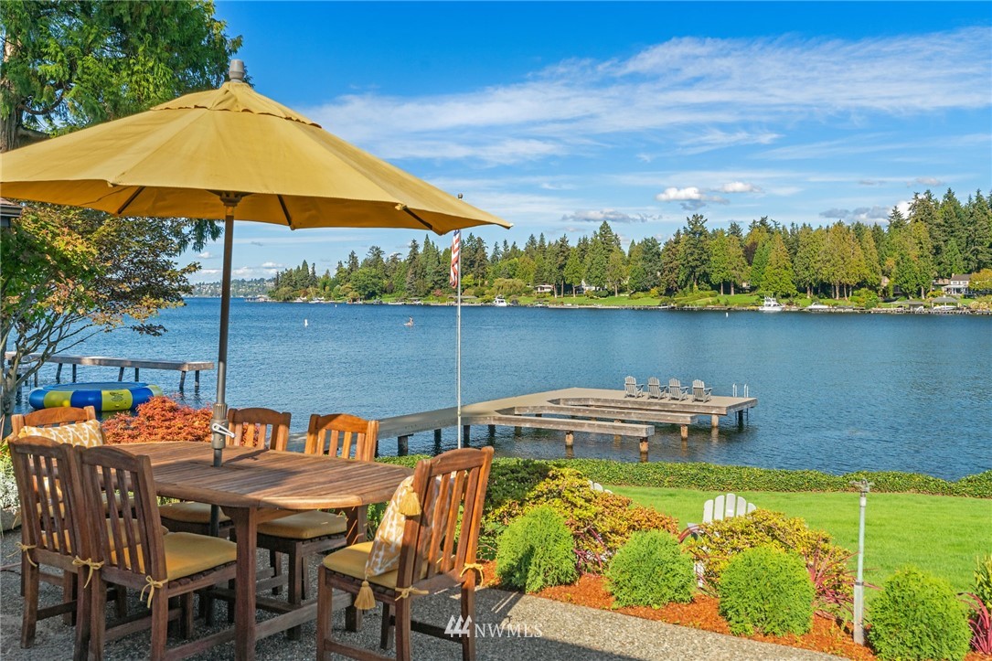 3436 Evergreen Point Road Medina, WA 98039 - Photo 10 of 16 a view of swimming pool with outdoor seating and plants