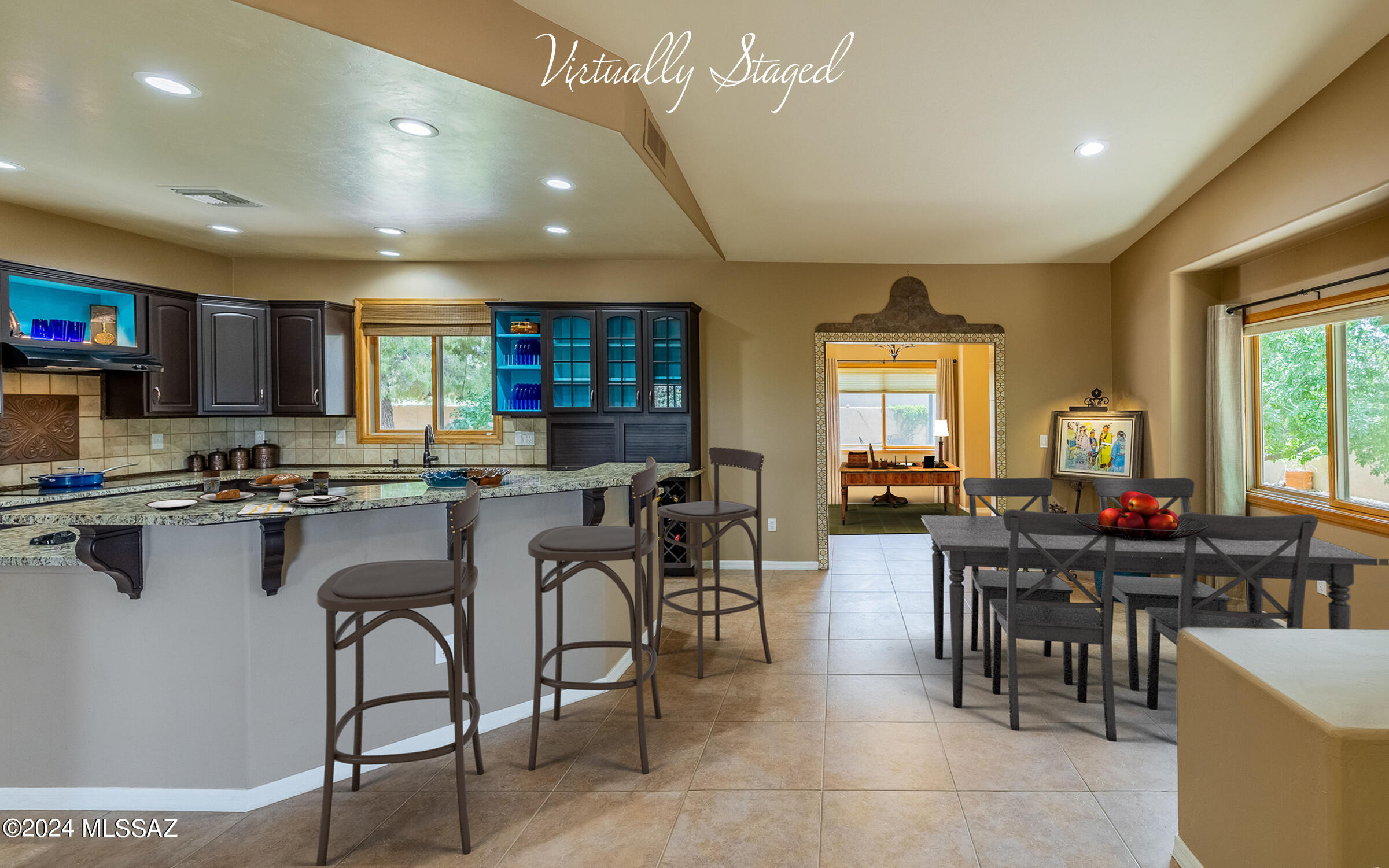 341 Sharon Road Vail, AZ 85641 - Photo 15 of 50 a open dining room with stainless steel appliances a dining table chairs and kitchen view