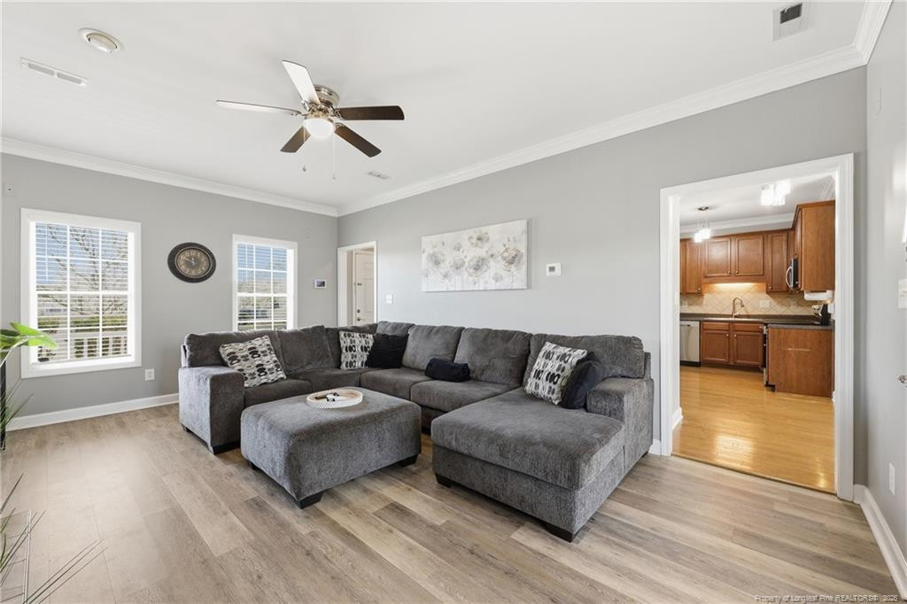 206 Blacksmith Lane Raeford, NC 28376 - Photo 16 of 48 a living room with furniture and a large window
