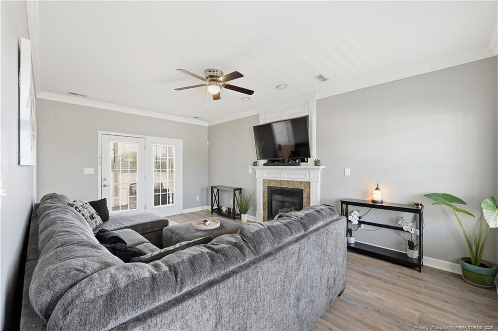 206 Blacksmith Lane Raeford, NC 28376 - Photo 19 of 48 a living room with furniture and a flat screen tv
