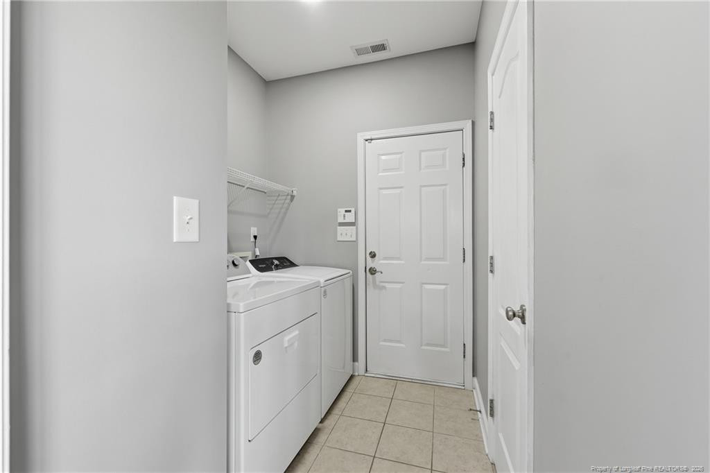 206 Blacksmith Lane Raeford, NC 28376 - Photo 20 of 48 a room view with a washer and dryer