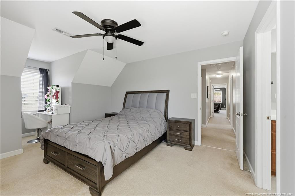 206 Blacksmith Lane Raeford, NC 28376 - Photo 23 of 48 a bedroom with a bed and window