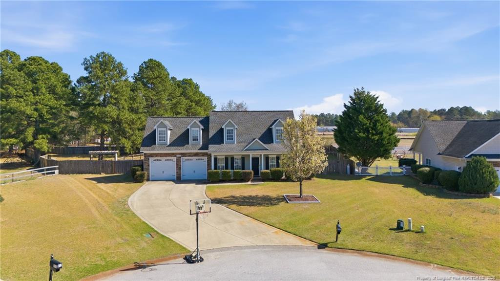 206 Blacksmith Lane Raeford, NC 28376 - Photo 3 of 48 a view of a swimming pool with a garden