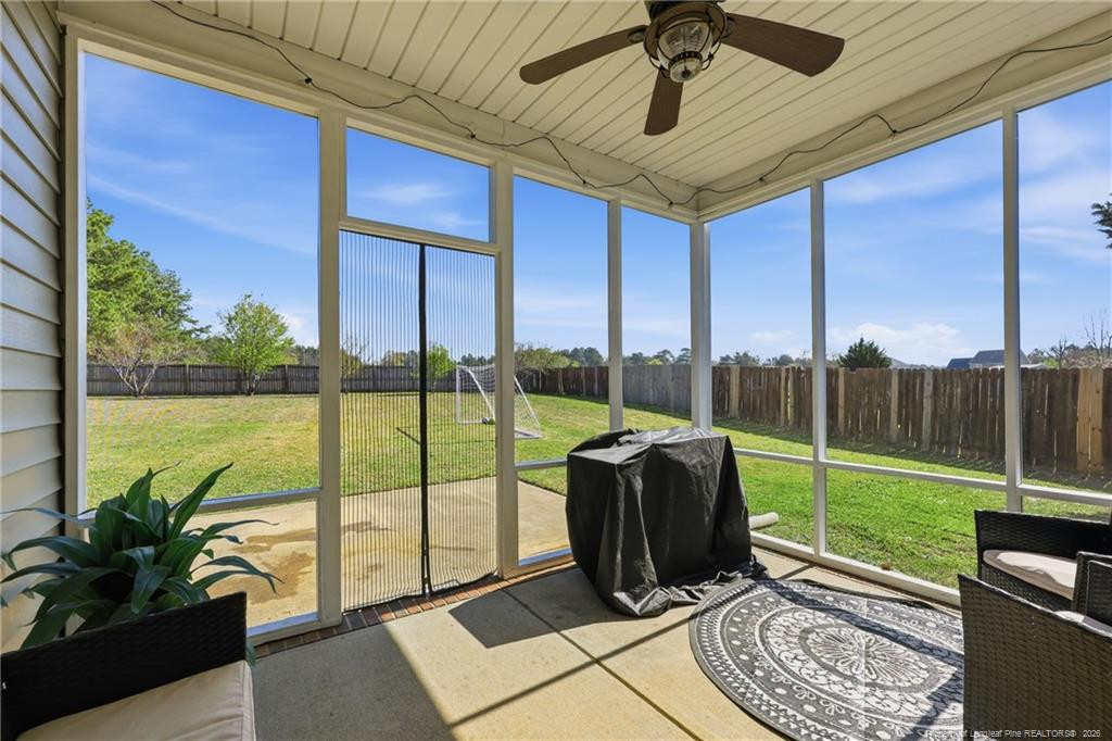 206 Blacksmith Lane Raeford, NC 28376 - Photo 40 of 48 a view of a porch with furniture and garden