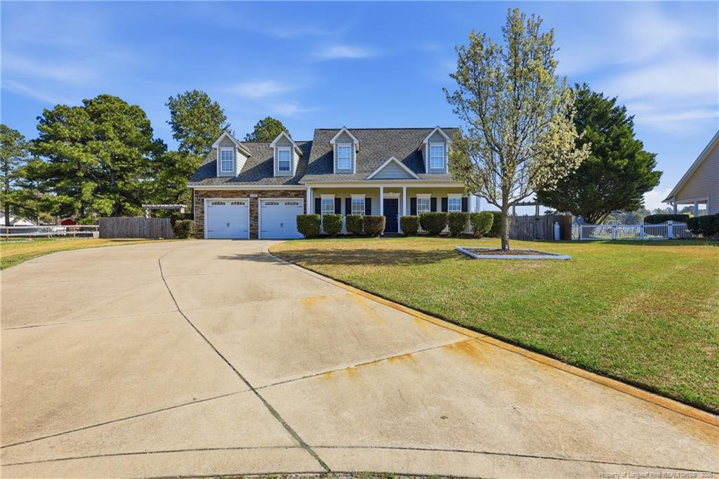 206 Blacksmith Lane Raeford, NC 28376 - Photo 4 of 48 a front view of a house with a yard