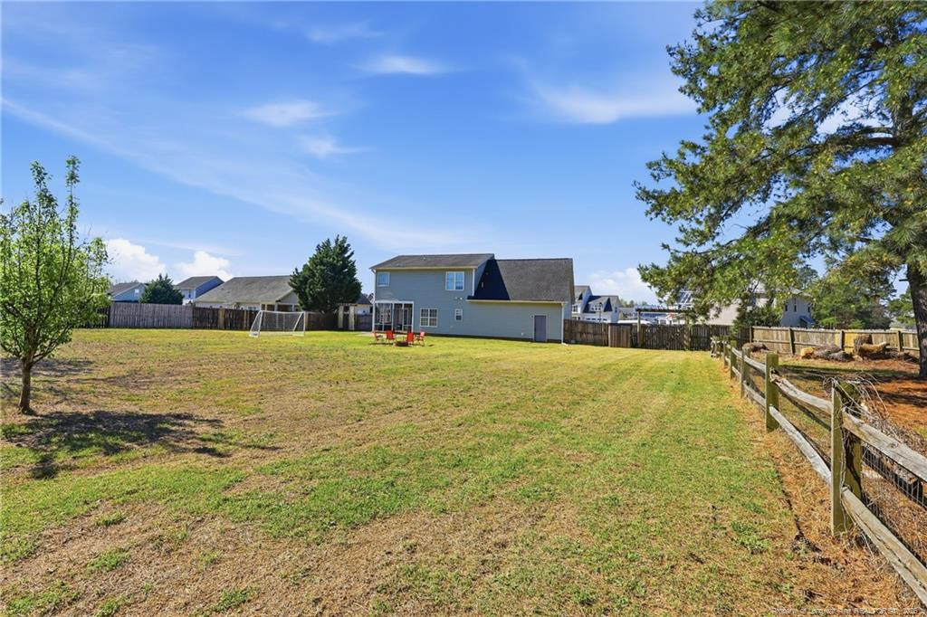 206 Blacksmith Lane Raeford, NC 28376 - Photo 44 of 48 a swimming pool with outdoor seating and yard