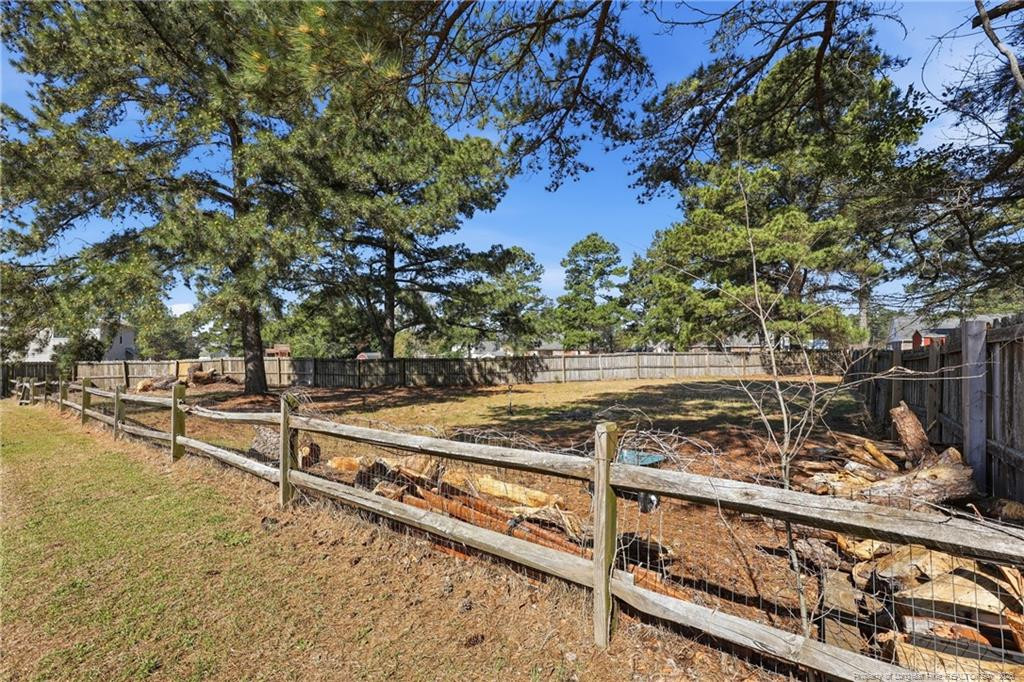 206 Blacksmith Lane Raeford, NC 28376 - Photo 45 of 48 a view of a swimming pool with a bench