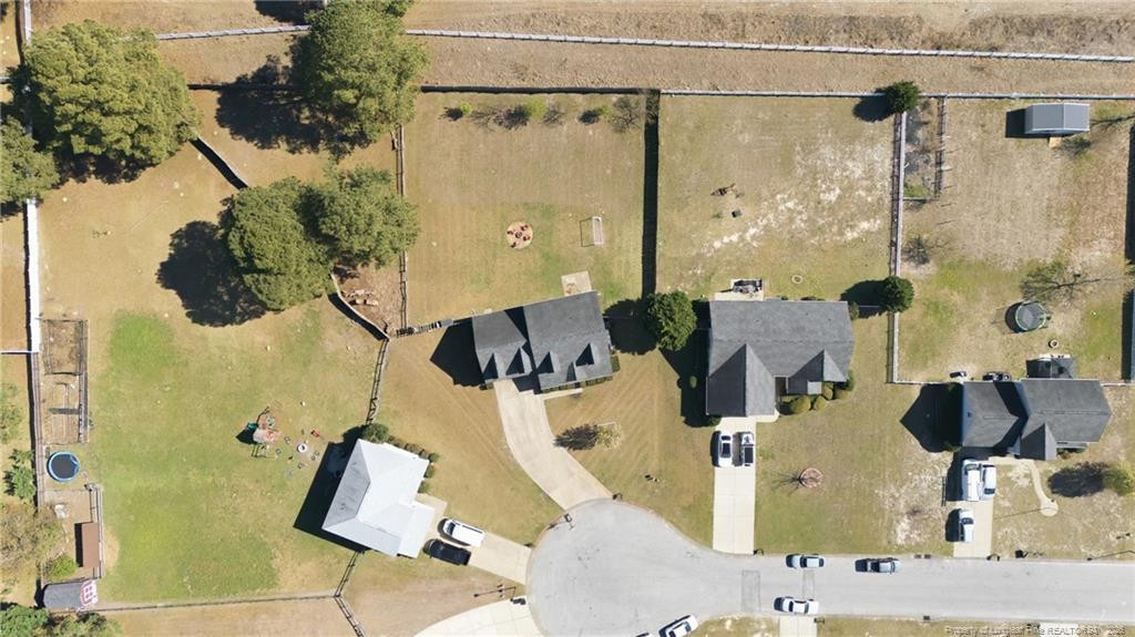 206 Blacksmith Lane Raeford, NC 28376 - Photo 46 of 48 an aerial view of a house with swimming pool
