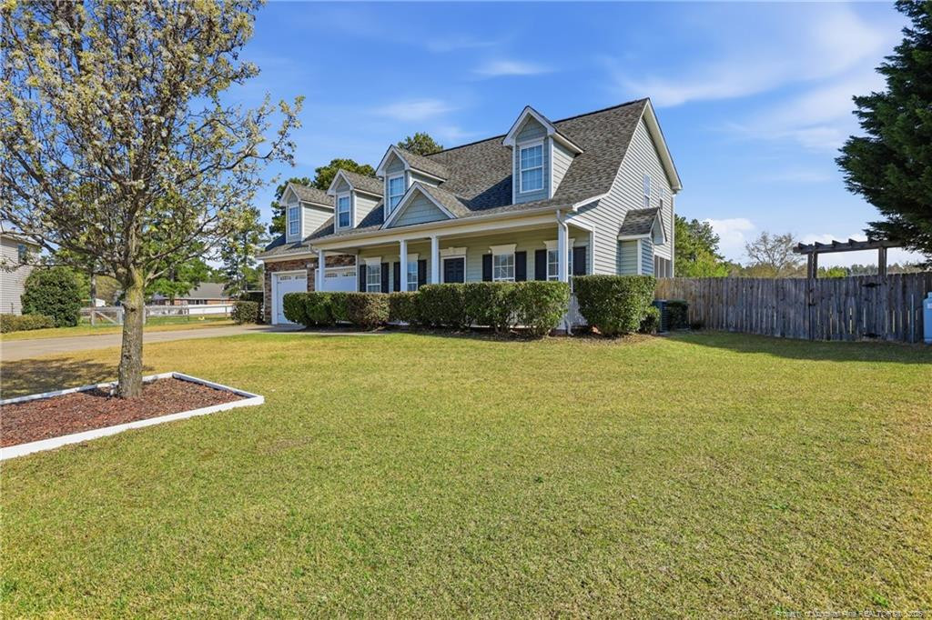 206 Blacksmith Lane Raeford, NC 28376 - Photo 5 of 48 a front view of a house with garden