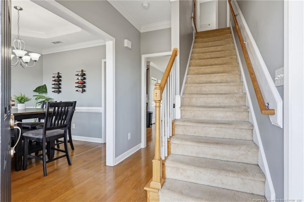 206 Blacksmith Lane Raeford, NC 28376 - Photo 8 of 48 a view of a dining room with furniture and wooden floor