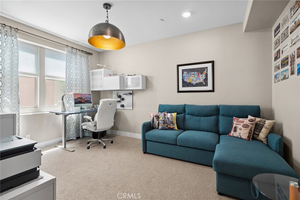 131 Spiral Irvine, CA 92618 - Photo 23 of 39 a living room with furniture and a window