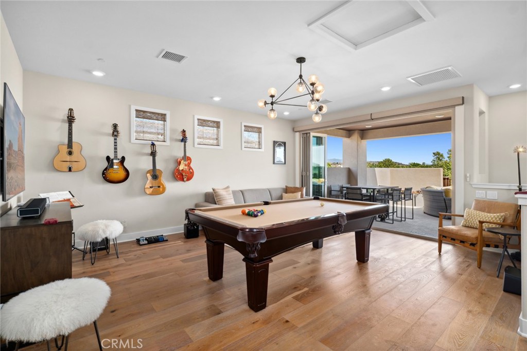 131 Spiral Irvine, CA 92618 - Photo 27 of 39 a room with furniture pool table wooden floor and windows