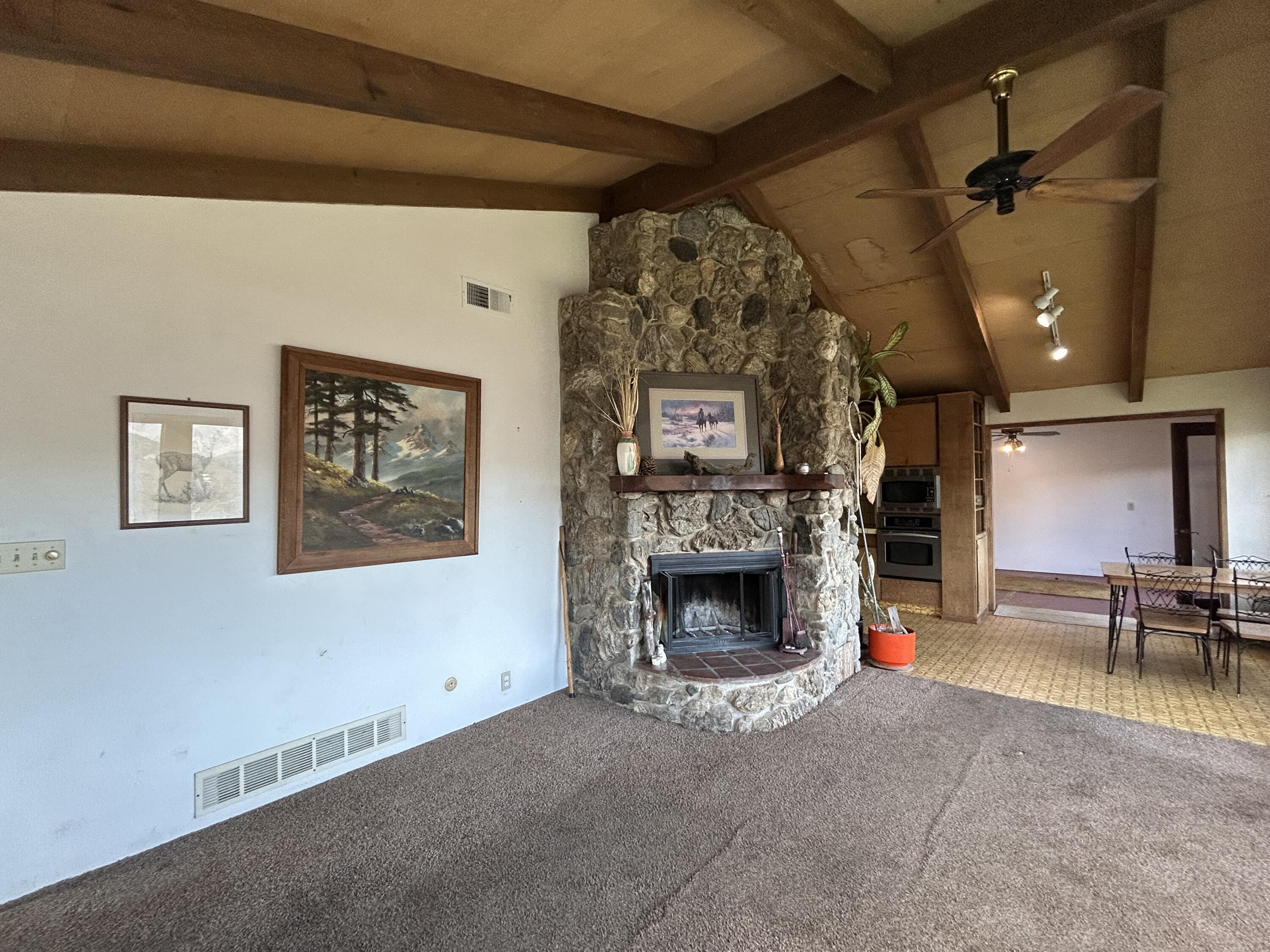 40838 Oak Ridge Drive Three Rivers, CA 93271 - Photo 18 of 51 a living room with furniture and a fireplace