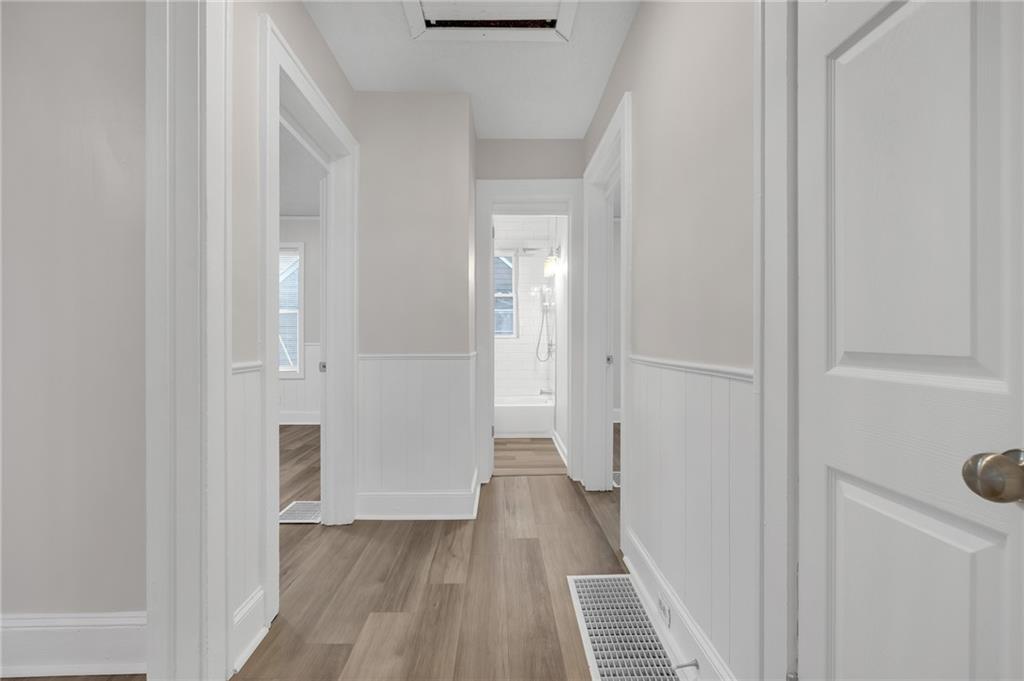 1683 Candler Road Decatur, GA 30032 - Photo 14 of 24 a view of a hallway with wooden floor