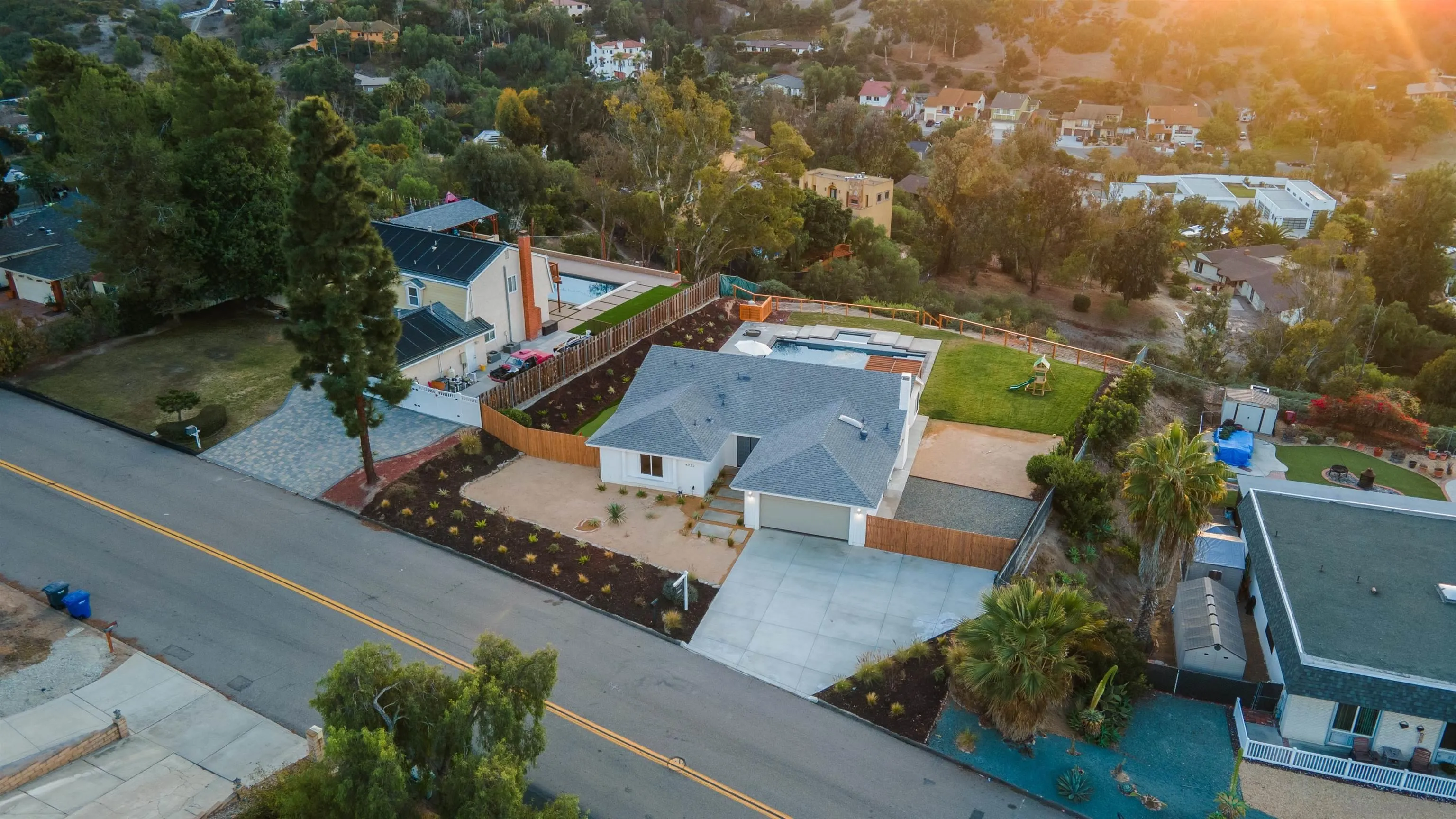 4032 Tim Street Bonita, CA 91902 - Photo 1 of 1 an aerial view of a house with a garden