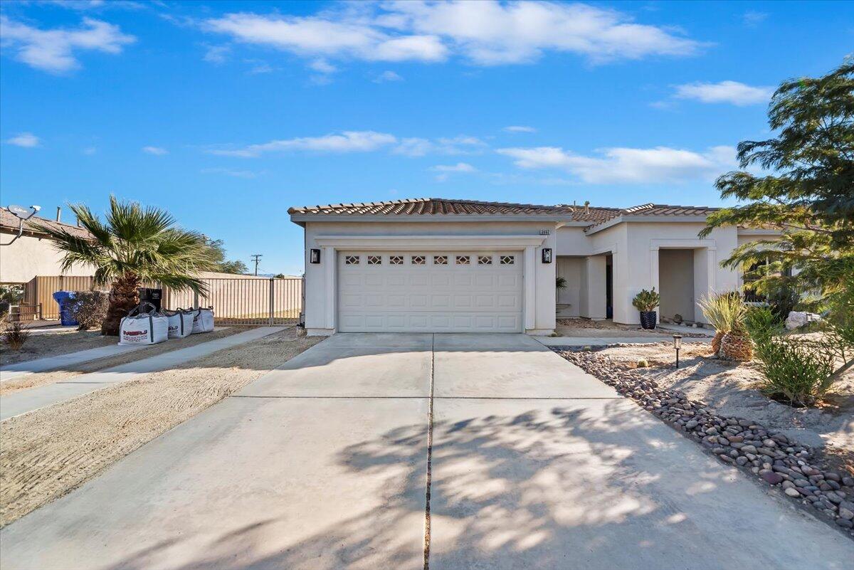 3982 Eastgate N Road Palm Springs, CA 92262 - Photo 49 of 55 a front view of a house with a garage