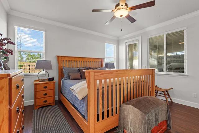 a view of a livingroom with furniture and a window