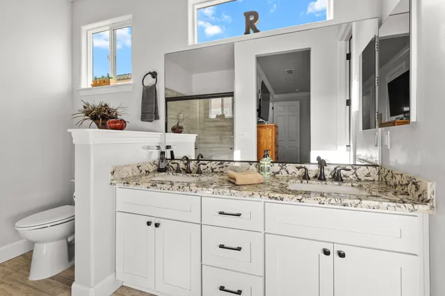 a view of a backyard with sitting area