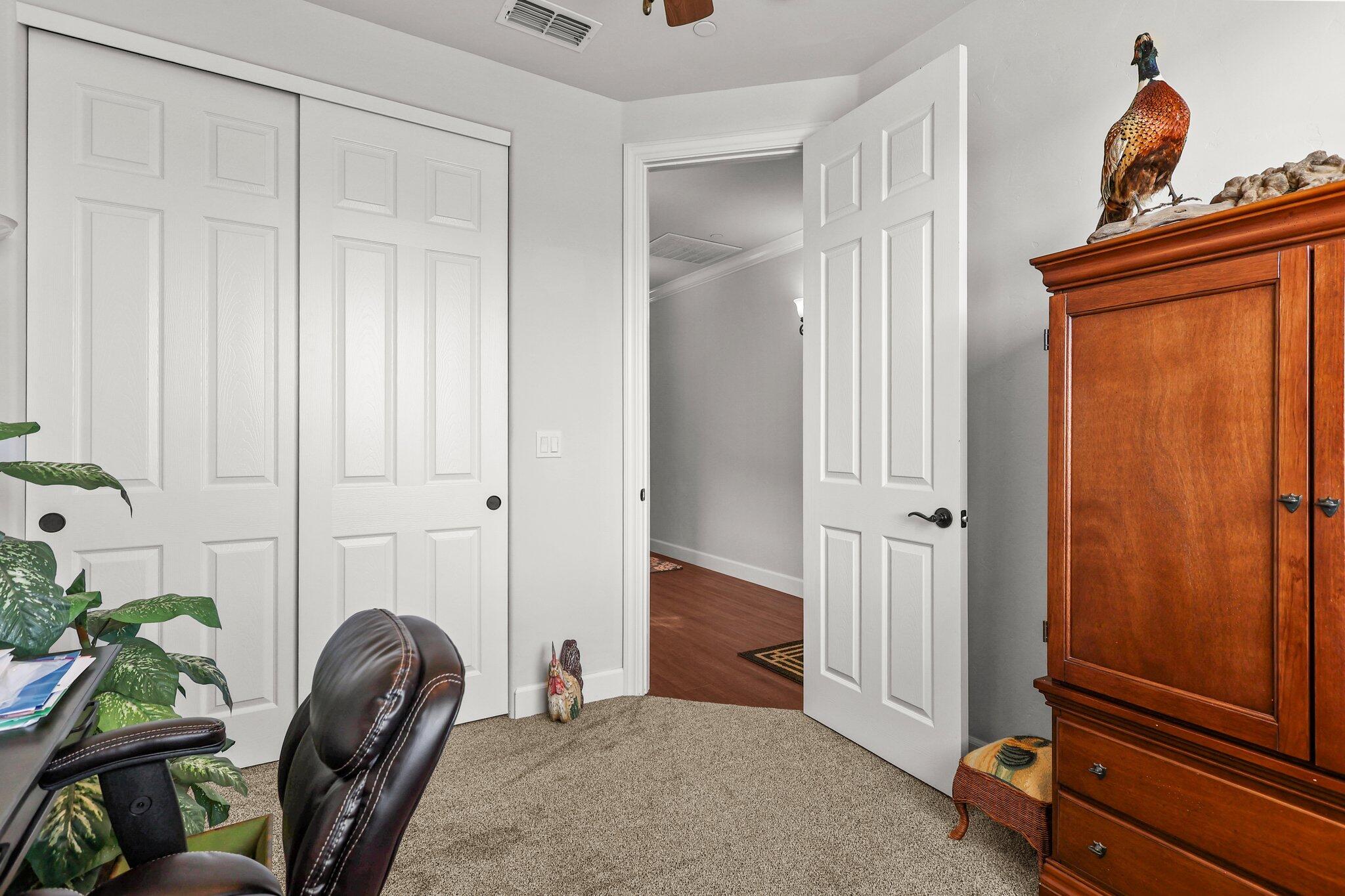 6180 Lucca Trail Redding, CA 96003 - Photo 25 of 42 a view of a livingroom with furniture and a window