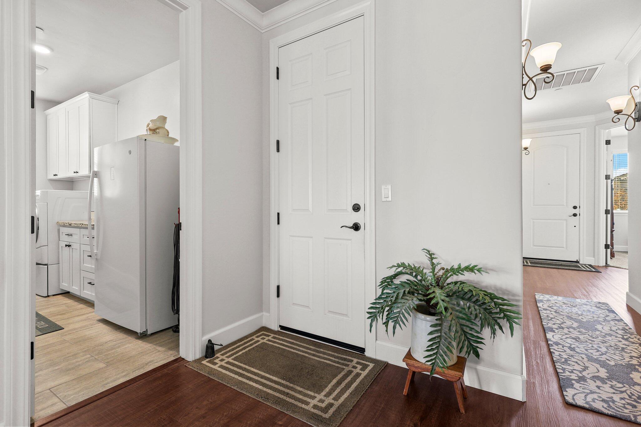6180 Lucca Trail Redding, CA 96003 - Photo 26 of 42 a room with furniture and a potted plant