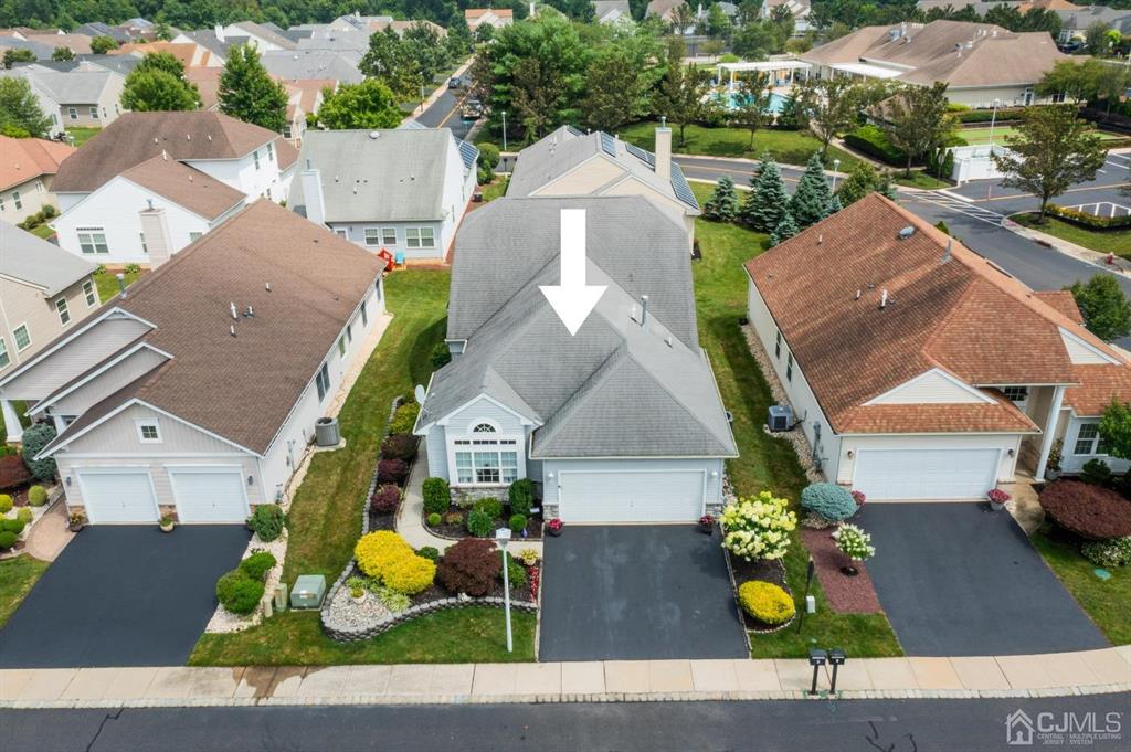 4 Merlot Court Monroe Township, NJ 08831 - Photo 2 of 17 an aerial view of a house with a yard and large trees