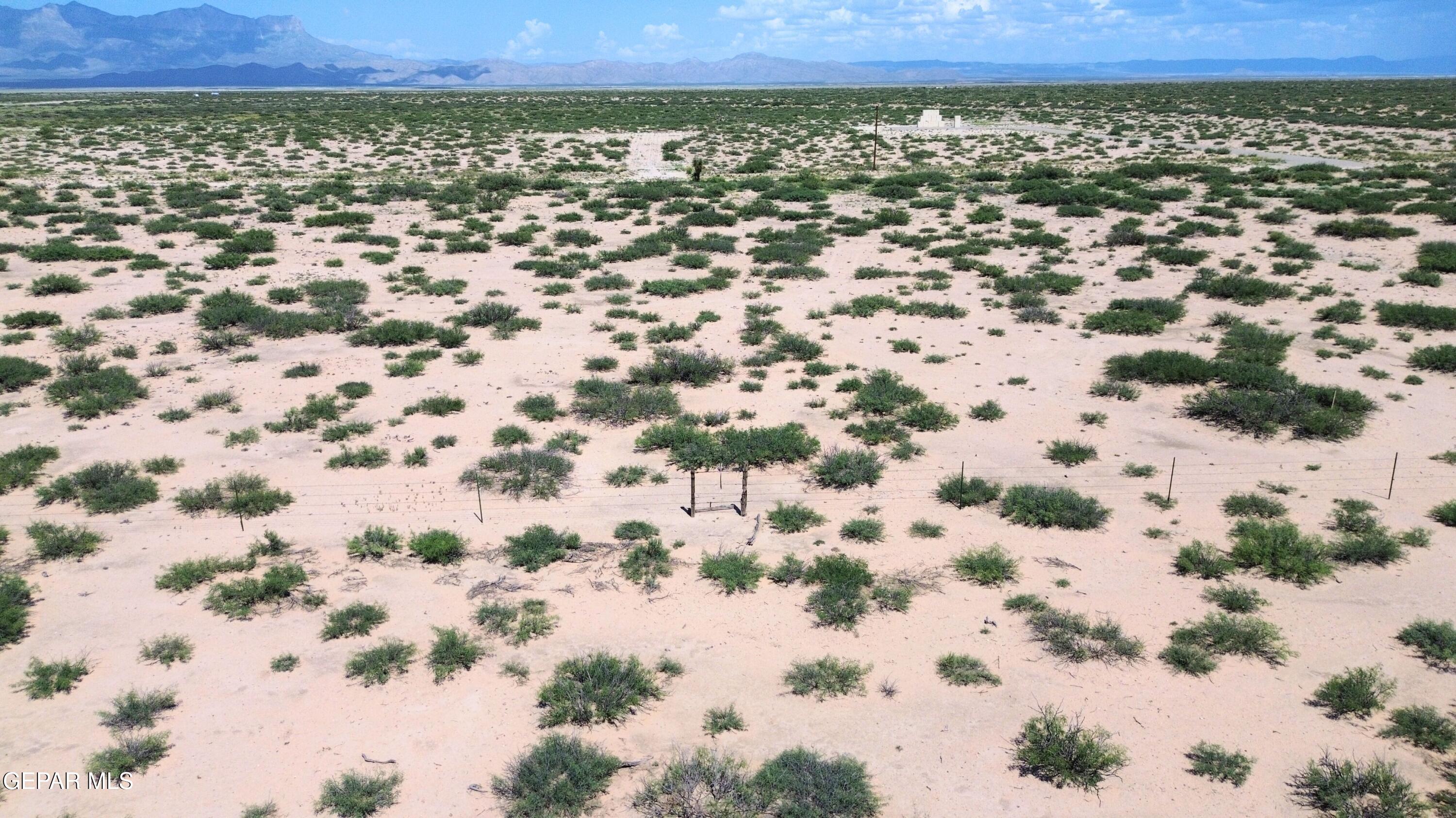 1-2 Ranch Road 1576 Dell City, TX 79847 - Photo 14 of 40 a view of a yard with an outdoor space