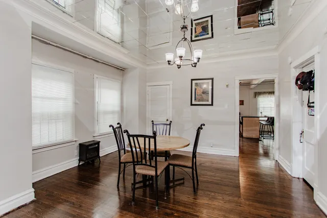 a kitchen with granite countertop a stove and cabinets