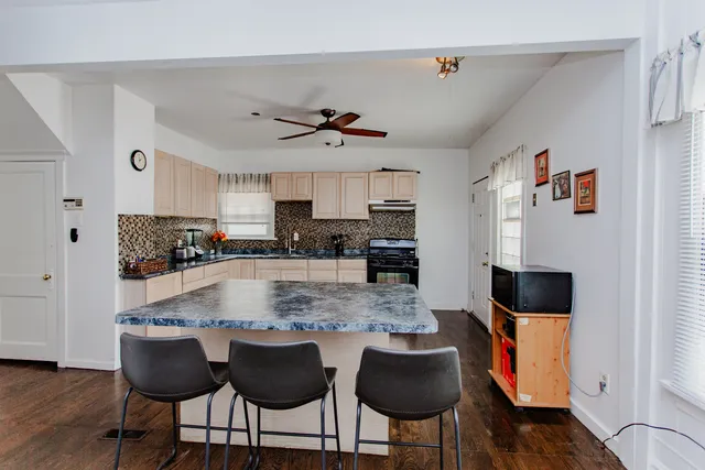 a bathroom with a shower and a sink