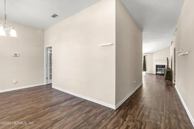 a view of a kitchen with appliances and cabinets