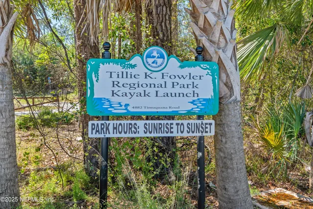 a view of a golf course with a lake