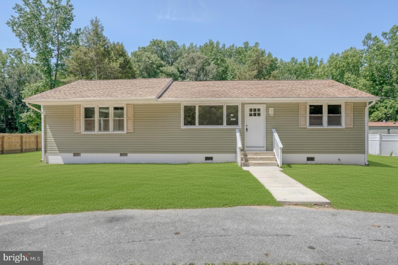 67 Morgans Choice Road Camden Wyoming, DE 19934 - Photo 11 of 56 a view of a house with a backyard