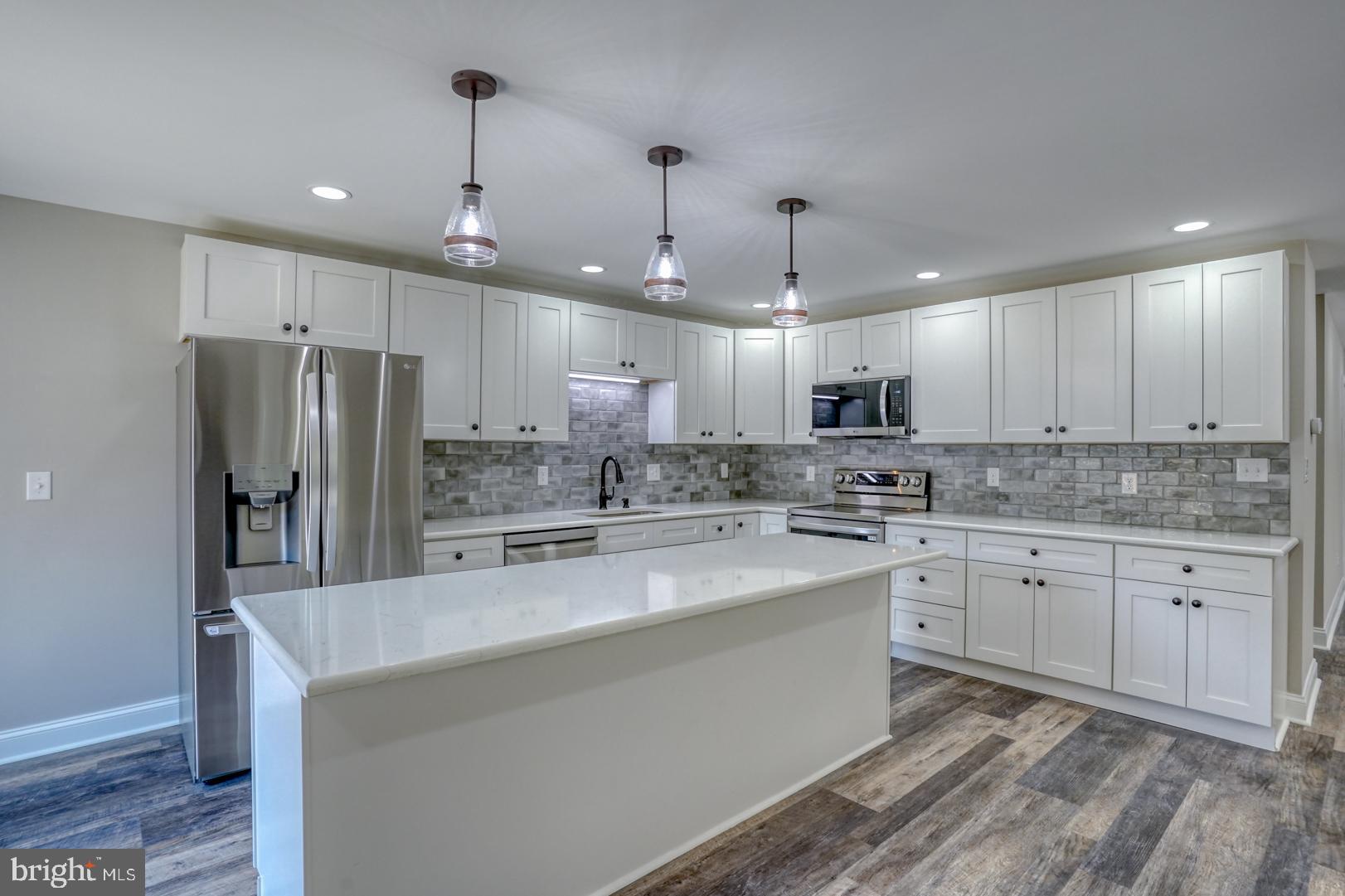 67 Morgans Choice Road Camden Wyoming, DE 19934 - Photo 2 of 56 a large kitchen with cabinets
