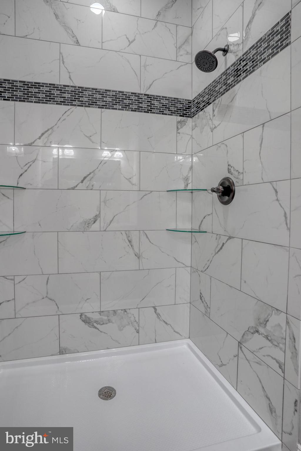 67 Morgans Choice Road Camden Wyoming, DE 19934 - Photo 28 of 56 a bathroom with a shower and a shower