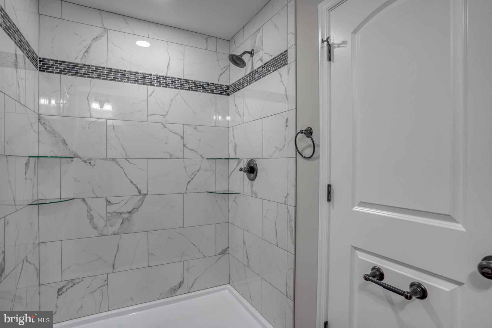 67 Morgans Choice Road Camden Wyoming, DE 19934 - Photo 32 of 56 a bathroom with a shower