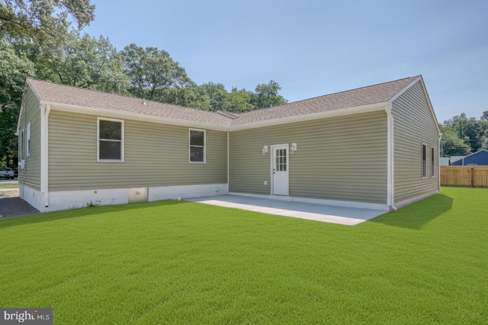 67 Morgans Choice Road Camden Wyoming, DE 19934 - Photo 55 of 56 a view of a backyard with a garden