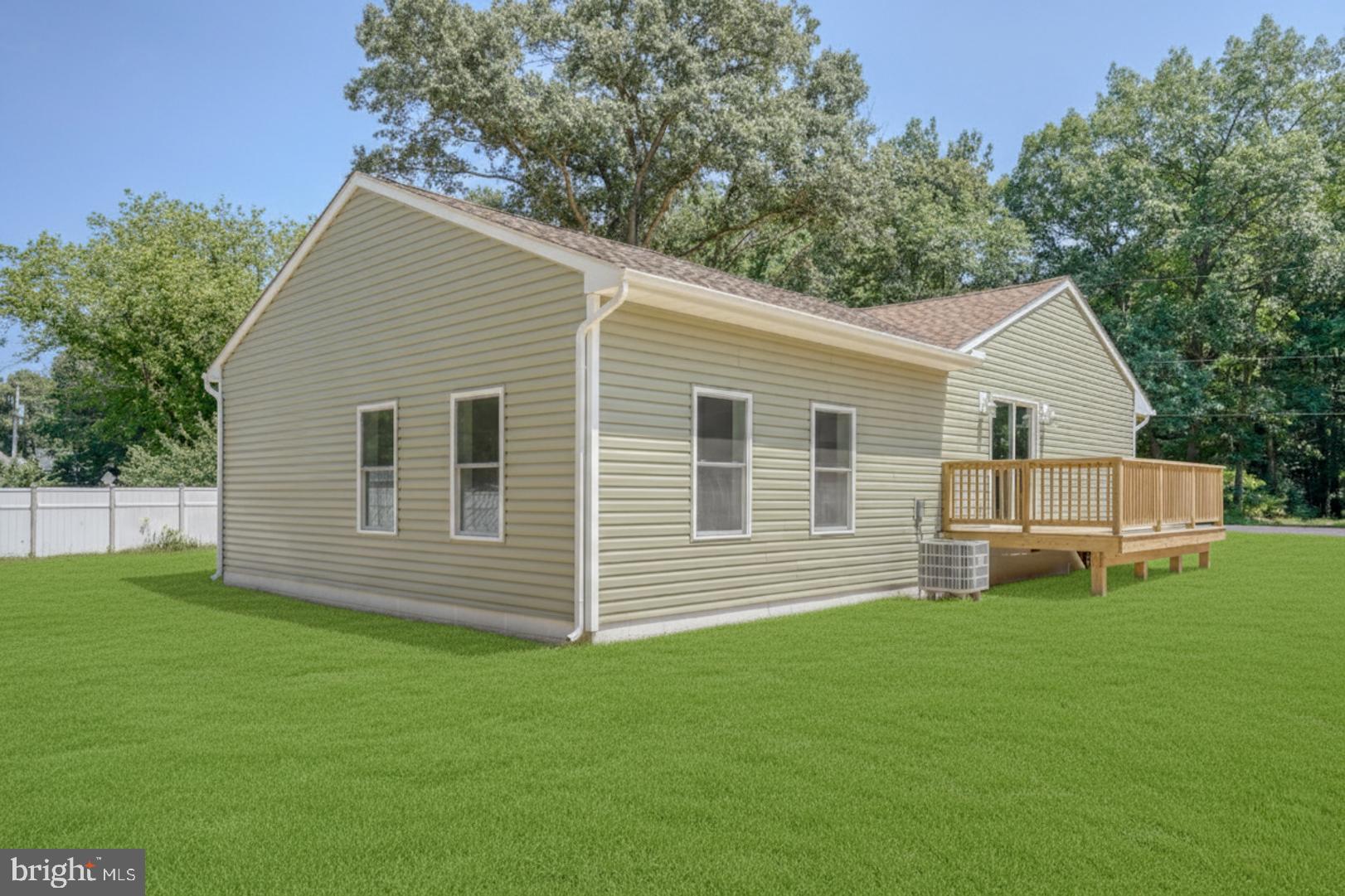 67 Morgans Choice Road Camden Wyoming, DE 19934 - Photo 56 of 56 a front view of a house with a yard and trees