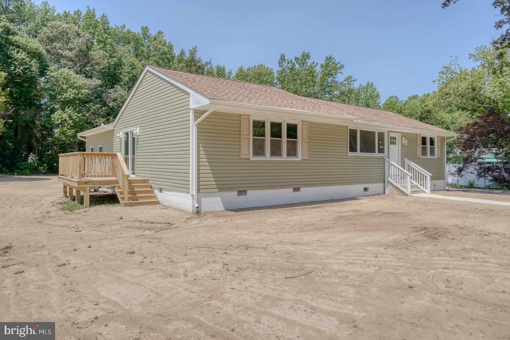67 Morgans Choice Road Camden Wyoming, DE 19934 - Photo 9 of 56 a view of a house with a backyard