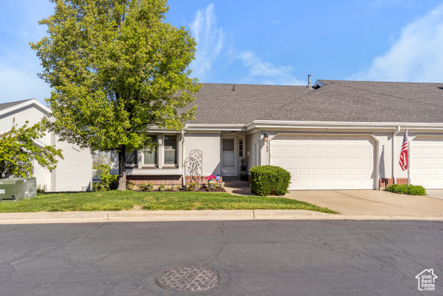 3782 Cardiff Way Bountiful, UT 84010 - Photo 1 of 1 View of front of home featuring stucco siding, driveway, a shingled roof, and a garage