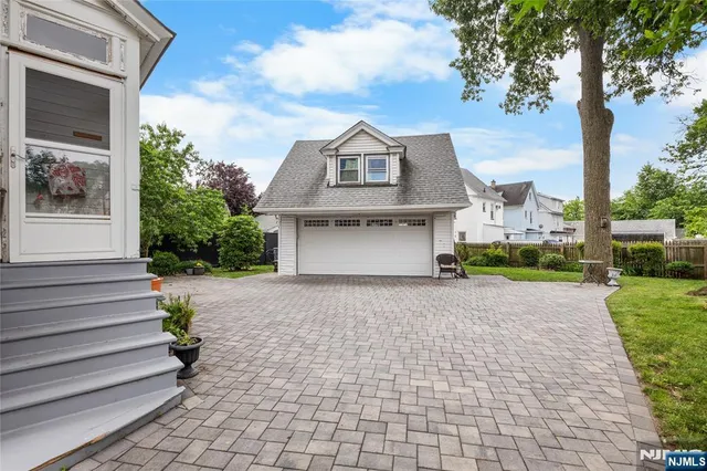 a house with trees in the background