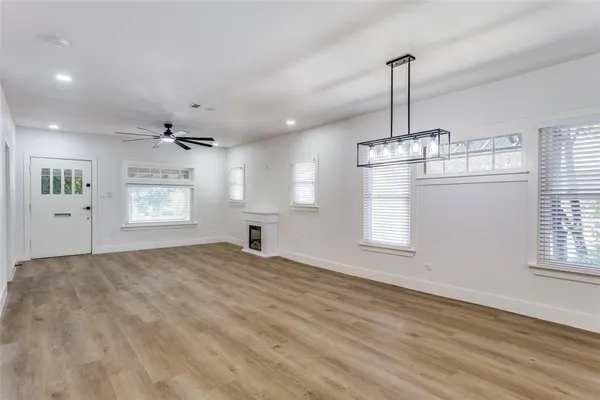 a view of empty room with windows