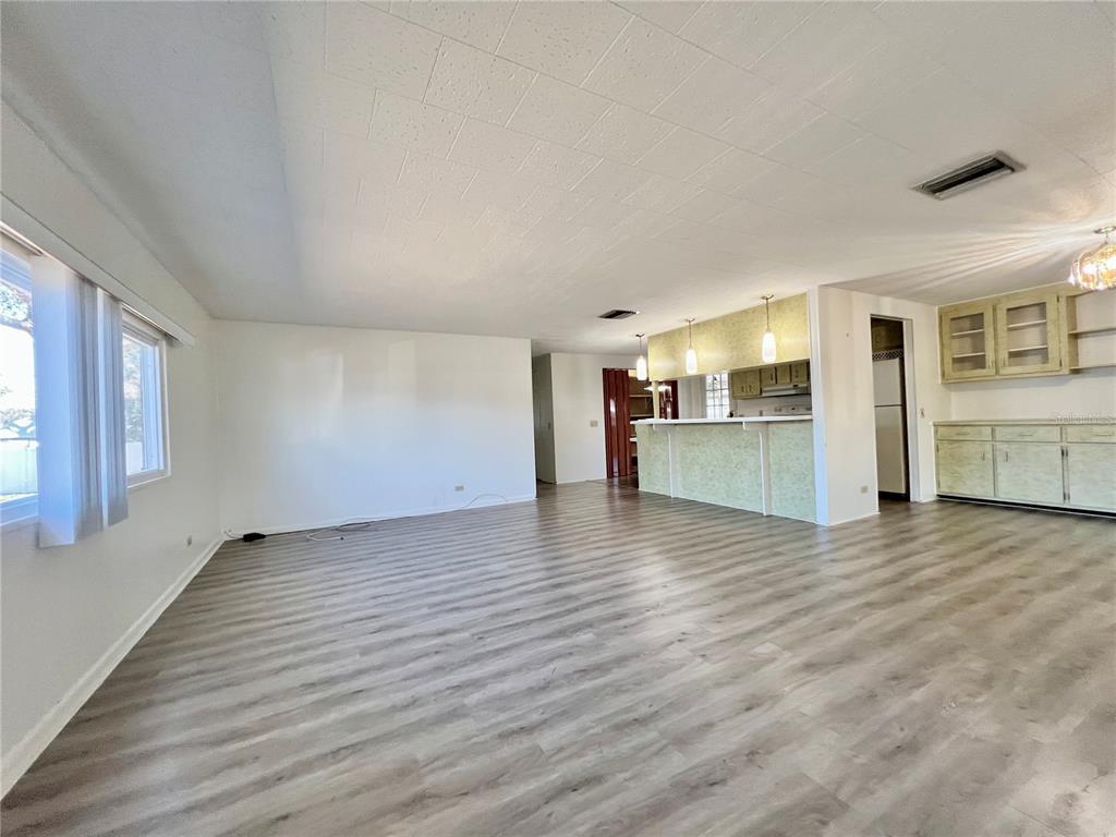 1100 South Belcher Road, Unit 781 Largo, FL 33771 - Photo 10 of 65 Living room into the kitchen