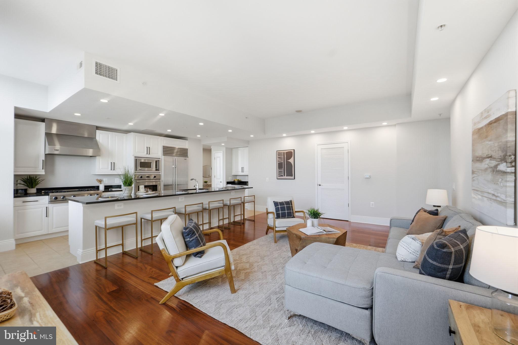 11990 Market Street, Unit 2103 Reston, VA 20190 - Photo 19 of 78 Spacious modern living area with elegance.