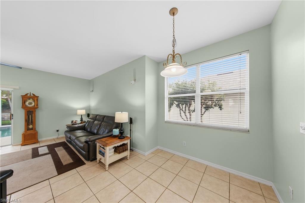 21632 Windham Run Estero, FL 33928 - Photo 17 of 50 a living room with furniture and a window