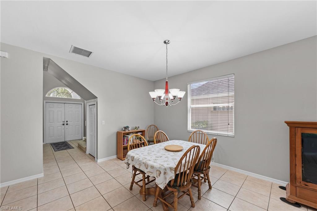 21632 Windham Run Estero, FL 33928 - Photo 18 of 50 a view of a workspace with furniture and a window