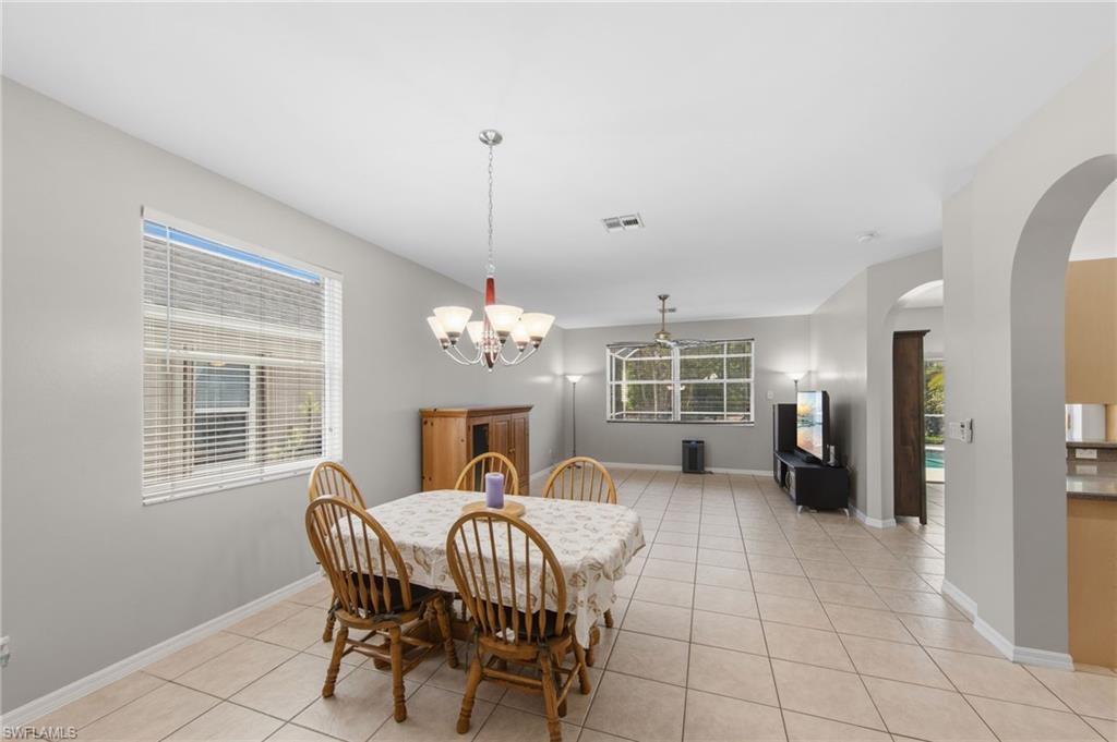 21632 Windham Run Estero, FL 33928 - Photo 3 of 50 a view of a livingroom with furniture chandelier